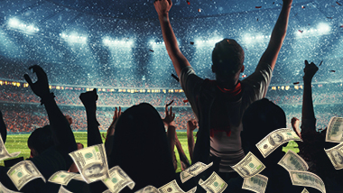 Cheering in a stadium, overlaid by cash.