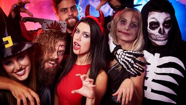 A group of friends dressed up for a Halloween Party!